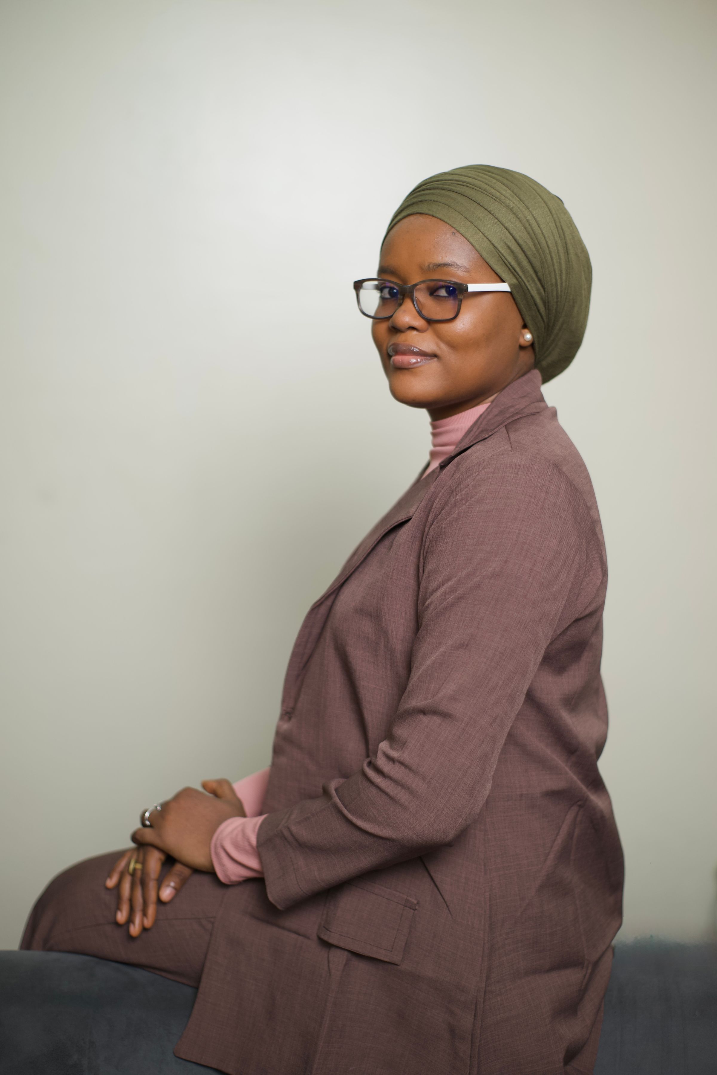 Professional portrait of Freda Adonoo, Creative Director and Marketing Lead at Optimed Consol