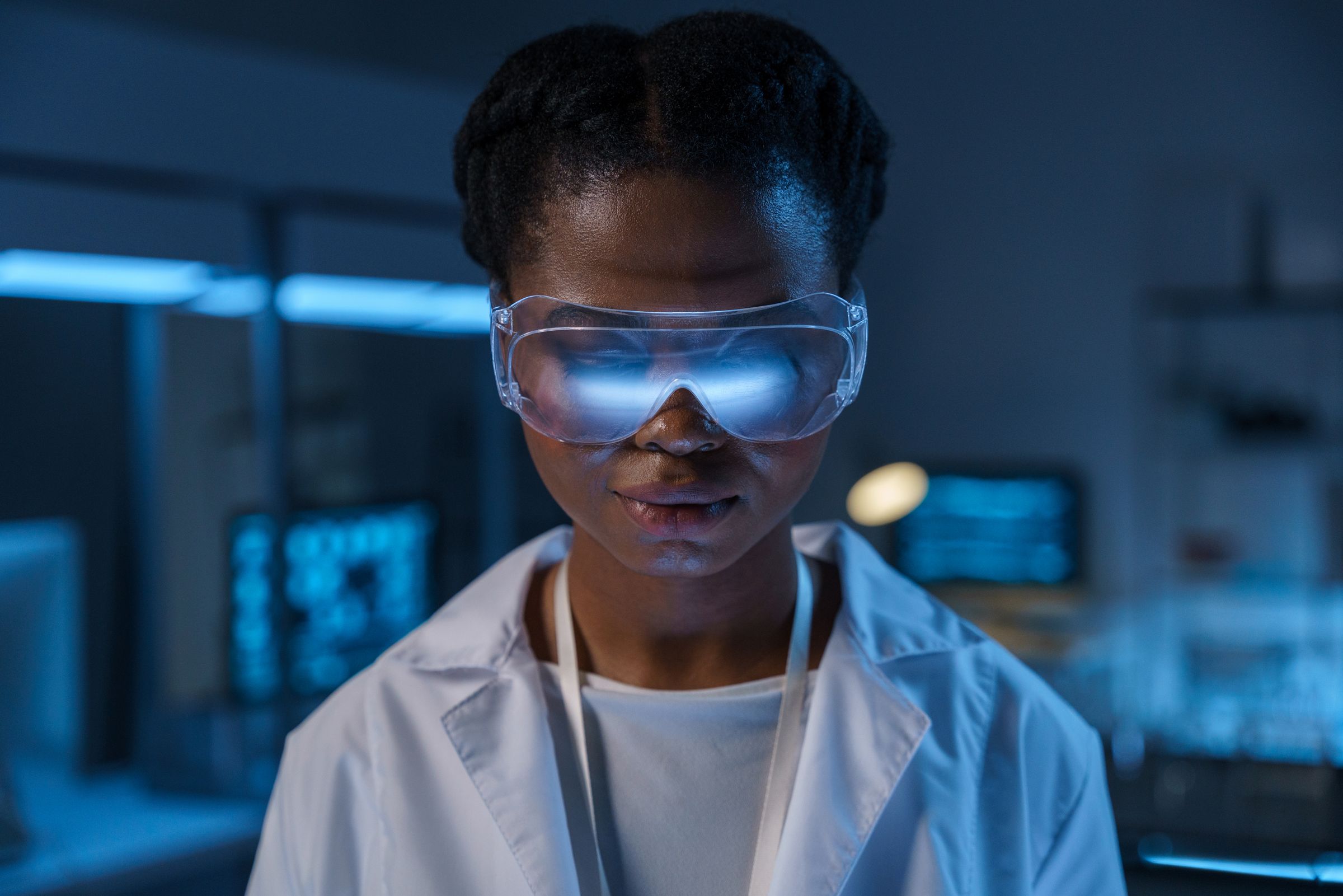 Modern pharmaceutical research laboratory in Ghana with scientists and regulated medical research equipment, clean clinical environment